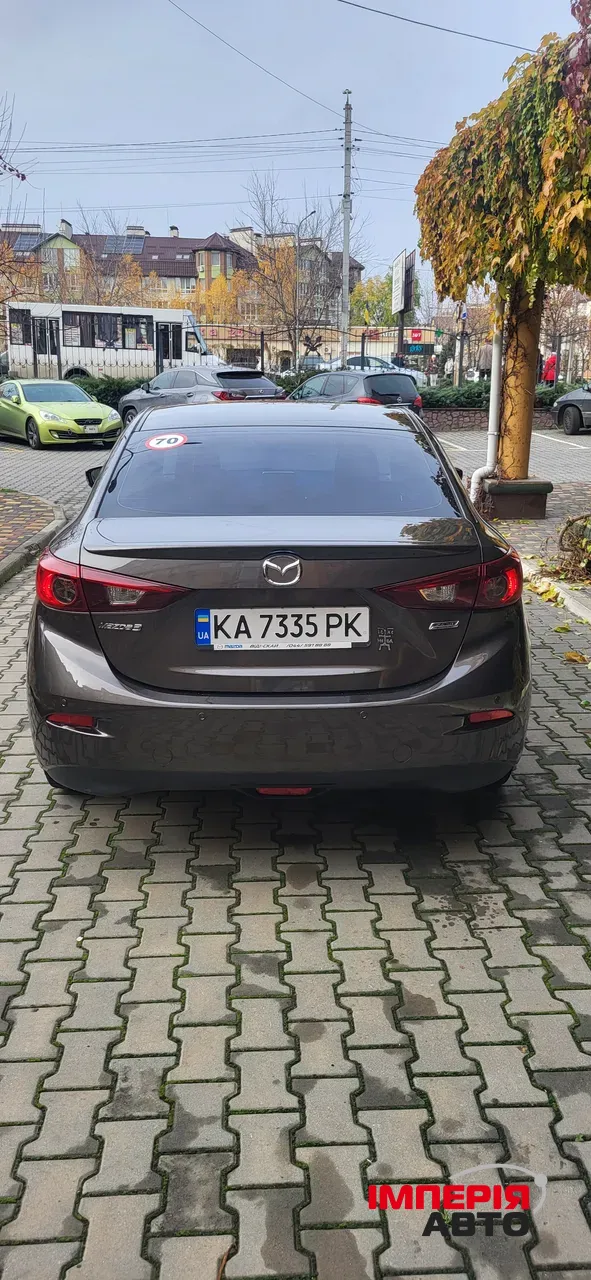 Mazda 3 - фото 5