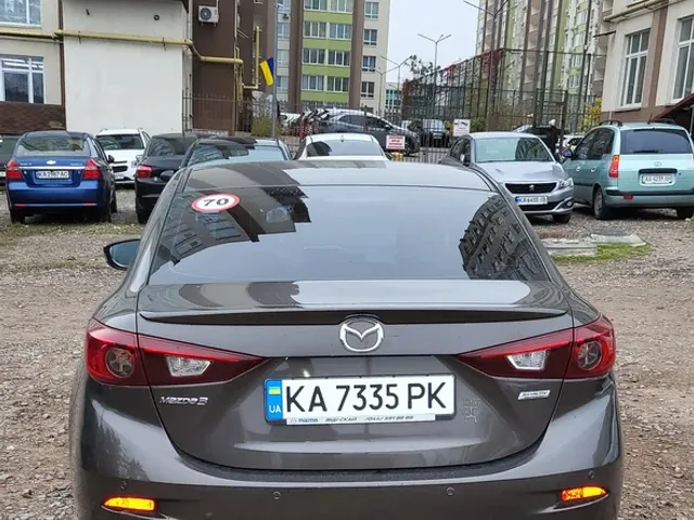 Mazda 3 - фото 5