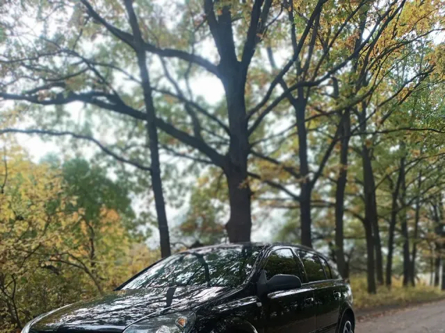Opel Astra - фото 1