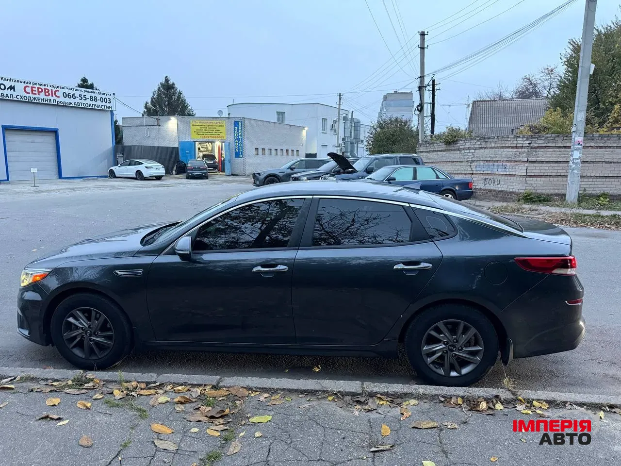Kia Optima - фото 5