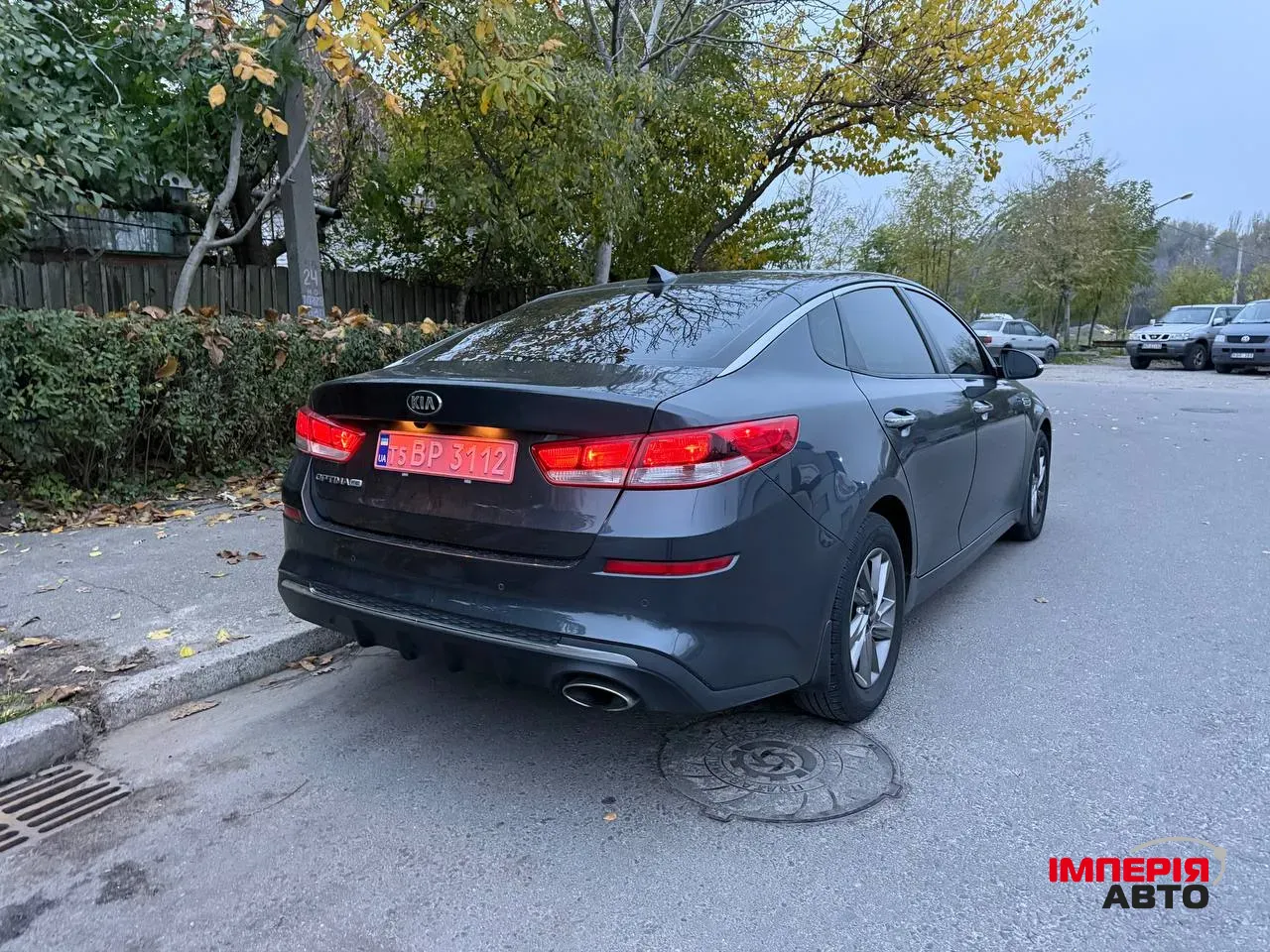 Kia Optima - фото 7