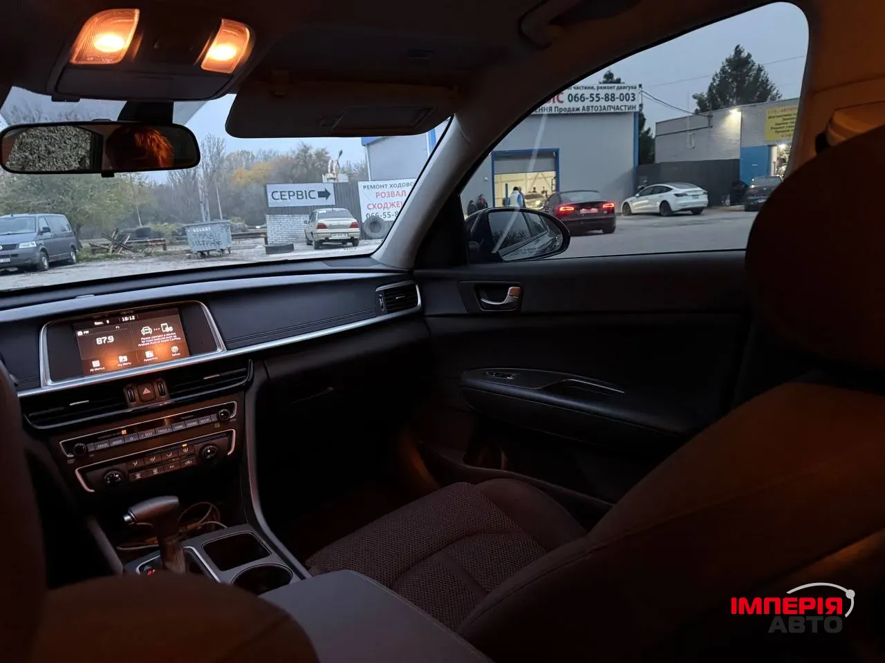 Kia Optima - фото 13