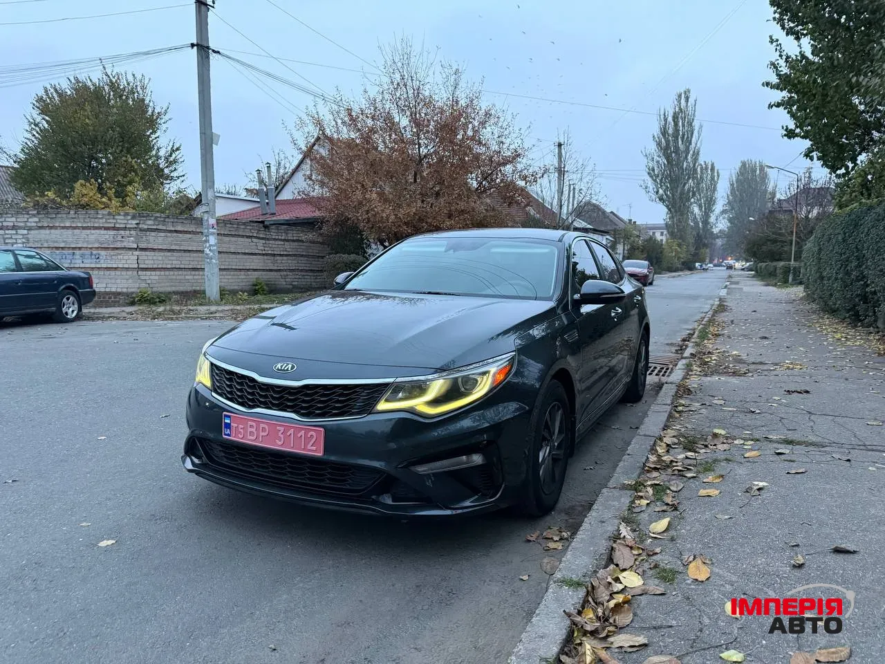 Kia Optima - фото 1