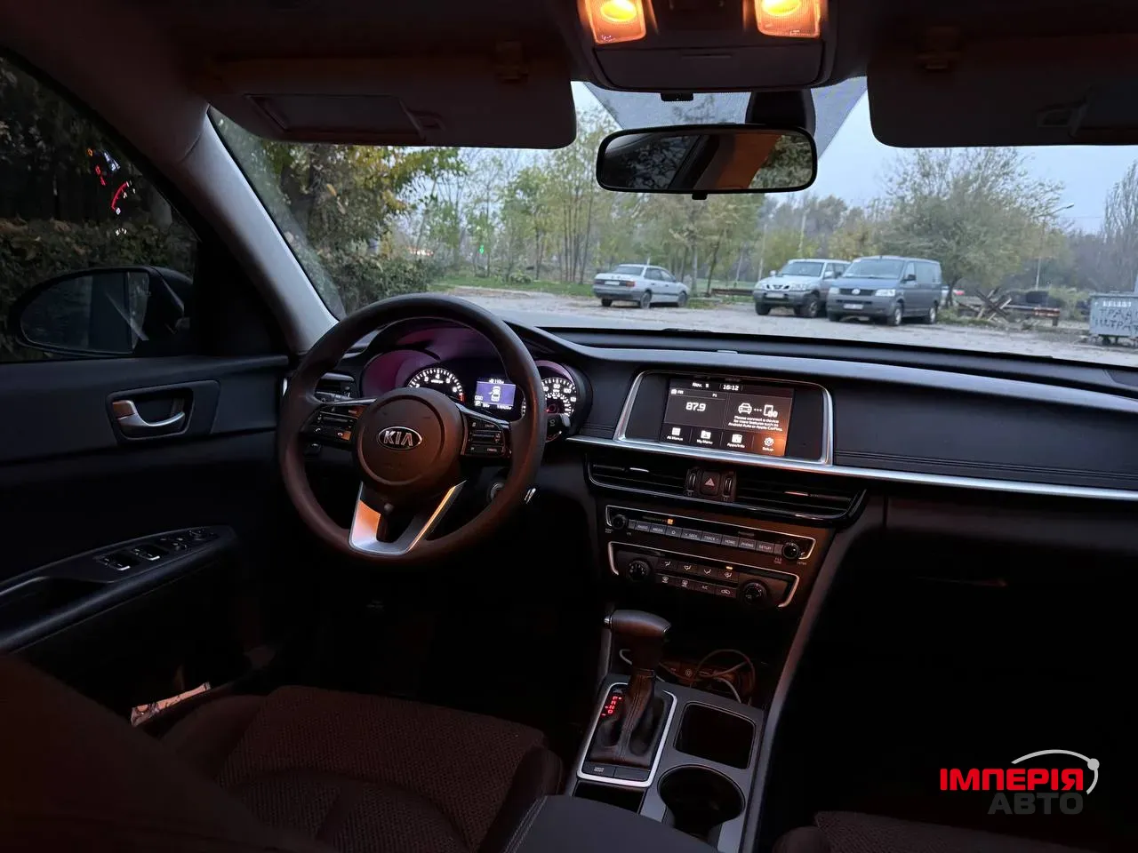 Kia Optima - фото 12