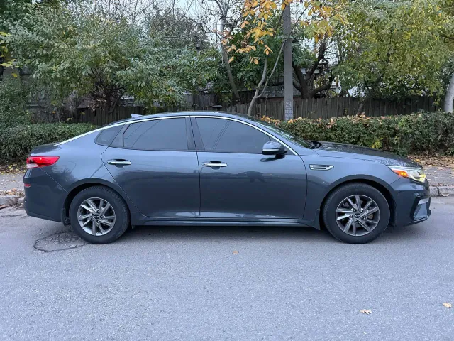 Kia Optima - фото 4