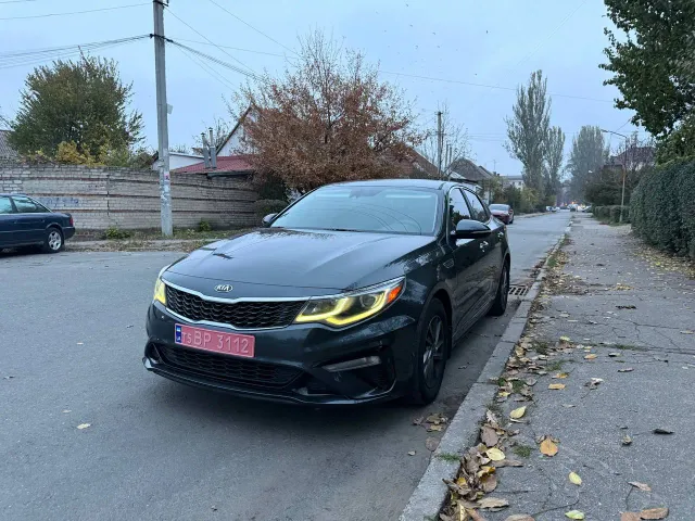 Kia Optima - фото 1