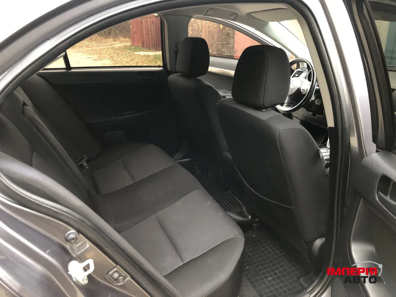 Mitsubishi Lancer - фото 10