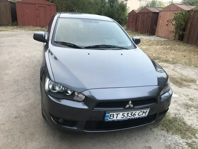 Mitsubishi Lancer - фото 1