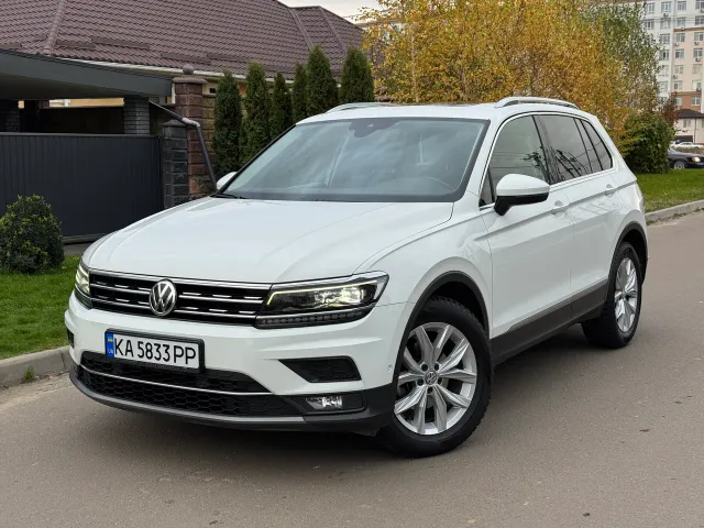 Volkswagen Tiguan - фото 1
