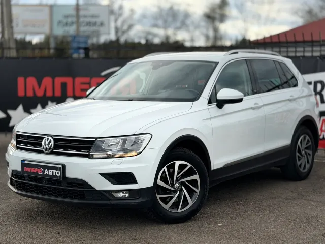 Volkswagen Tiguan - фото 1