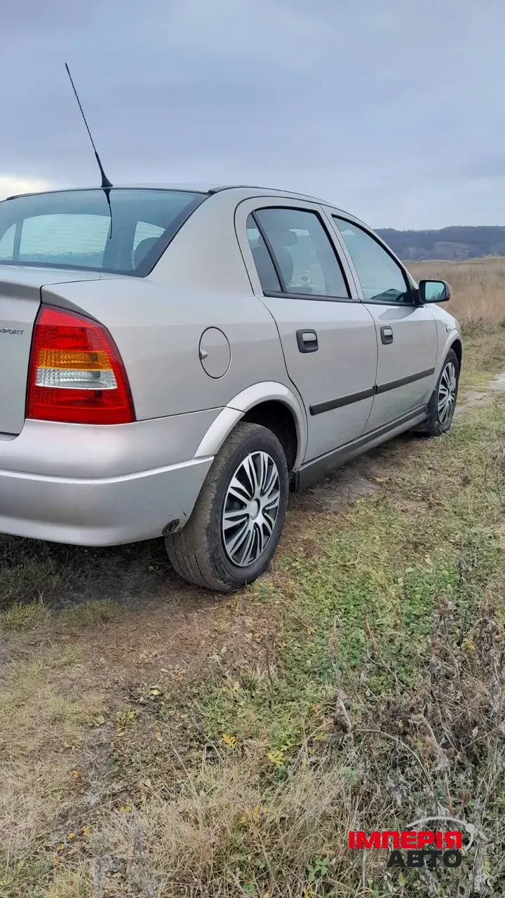Opel Astra - фото 4