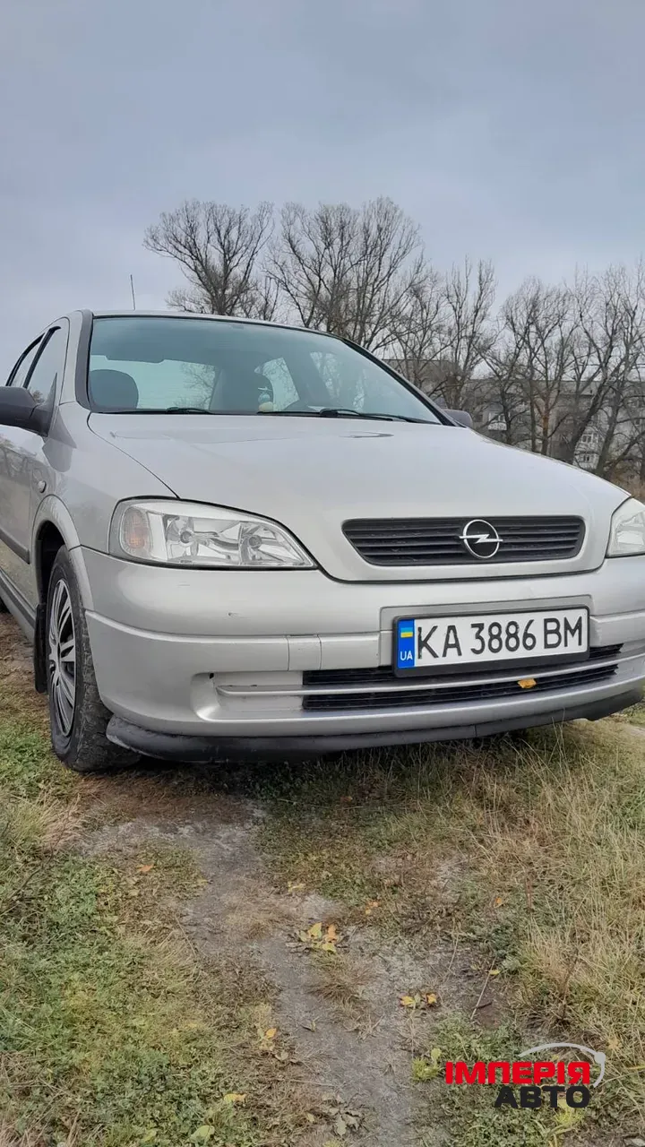 Opel Astra - фото 1