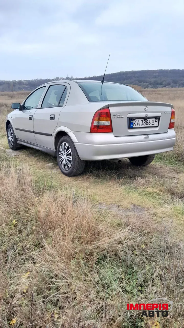 Opel Astra - фото 5