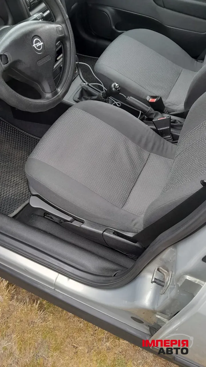 Opel Astra - фото 6