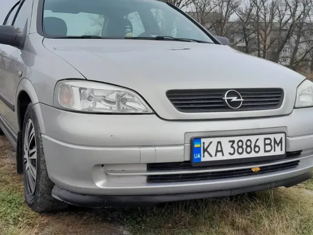Opel Astra - фото 1
