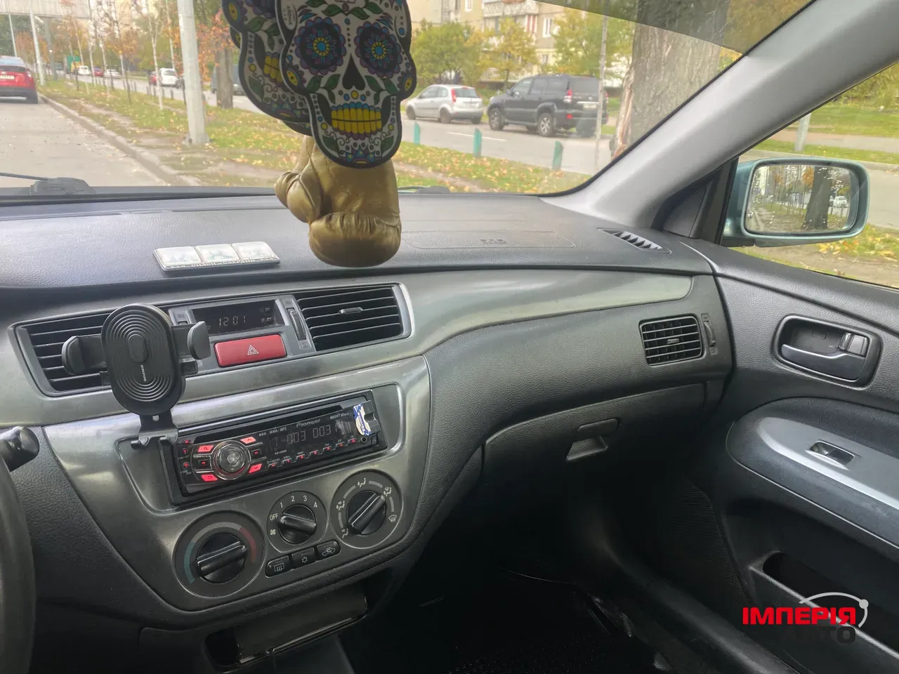 Mitsubishi Lancer - фото 1