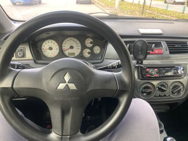Mitsubishi Lancer - фото 2