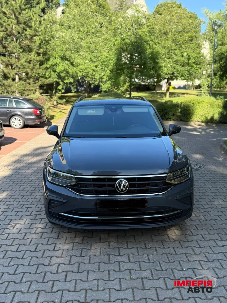 Volkswagen Tiguan - фото 1