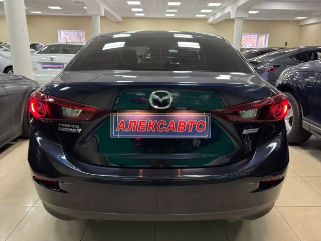 Mazda 3 - фото 4