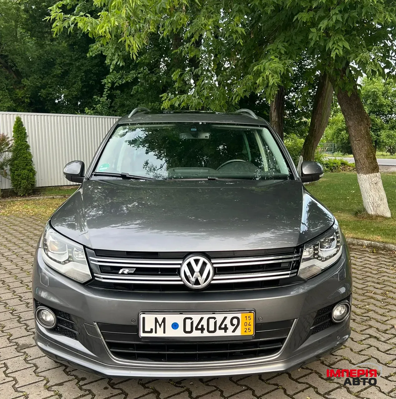 Volkswagen Tiguan - фото 1