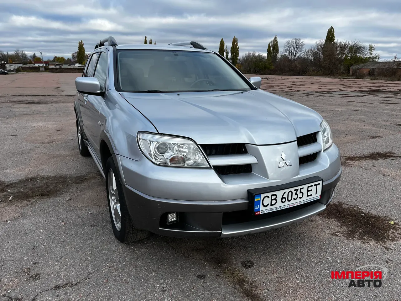 Mitsubishi Outlander - фото 1