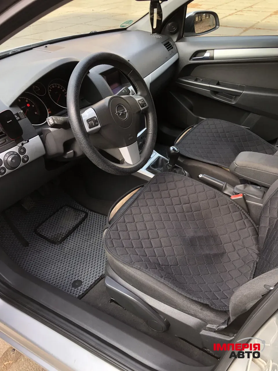 Opel Astra - фото 11