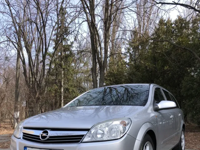 Opel Astra - фото 1