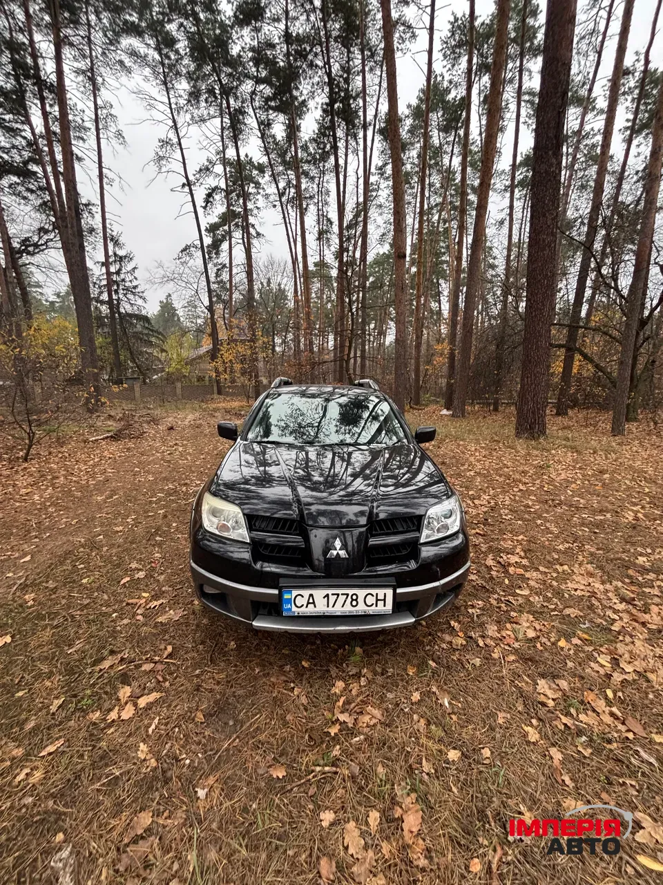 Mitsubishi Outlander - фото 1