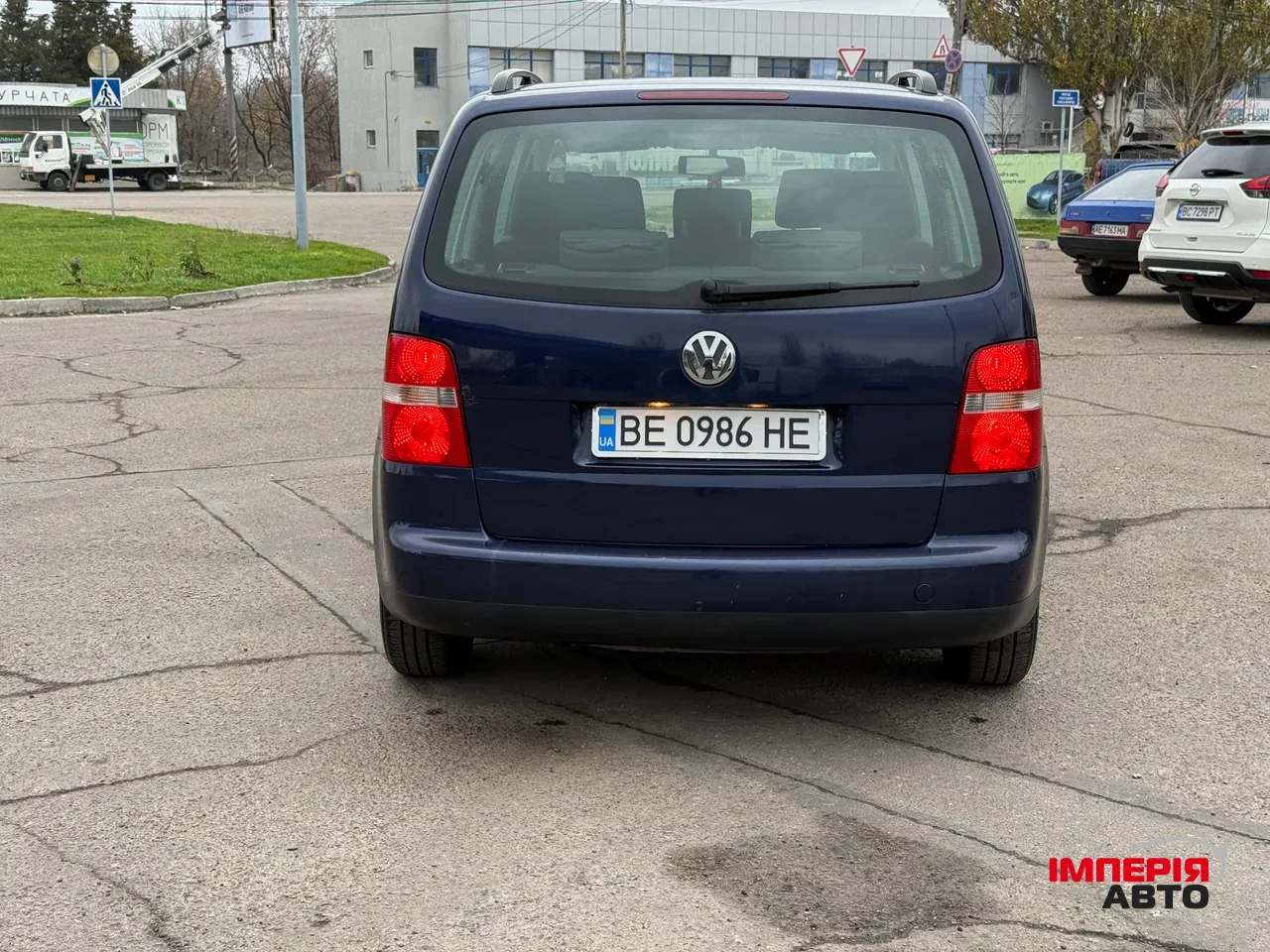 Volkswagen Touran - фото 5