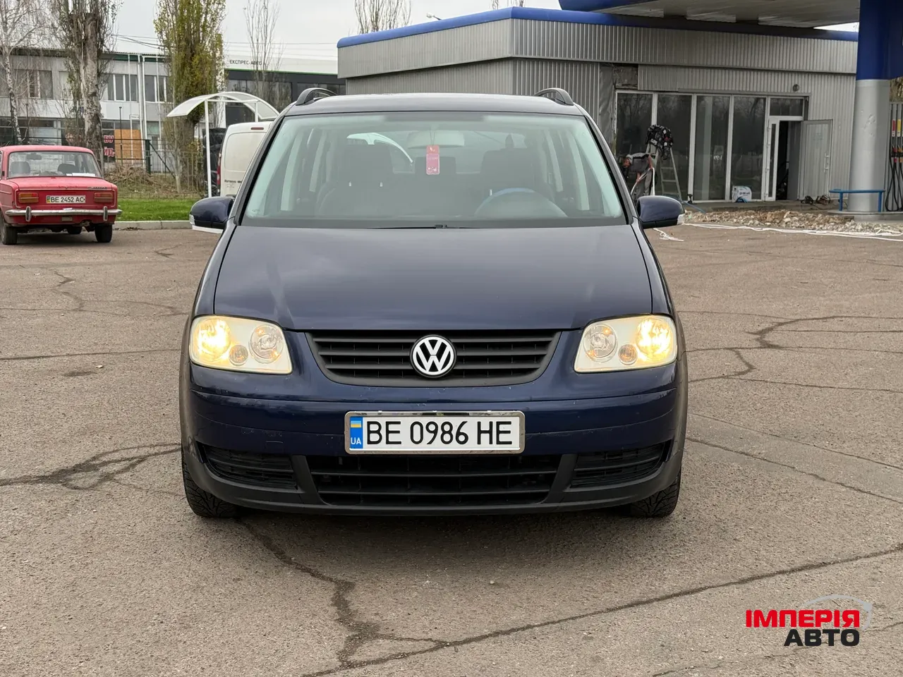 Volkswagen Touran - фото 2