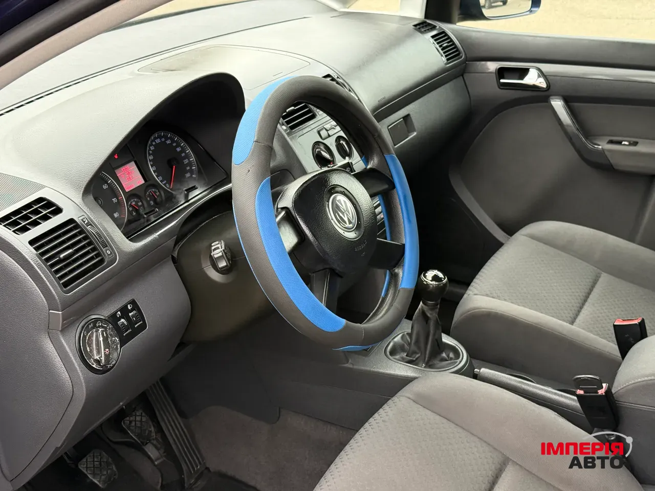 Volkswagen Touran - фото 8