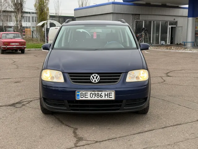 Volkswagen Touran - фото 2