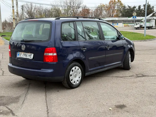 Volkswagen Touran - фото 4