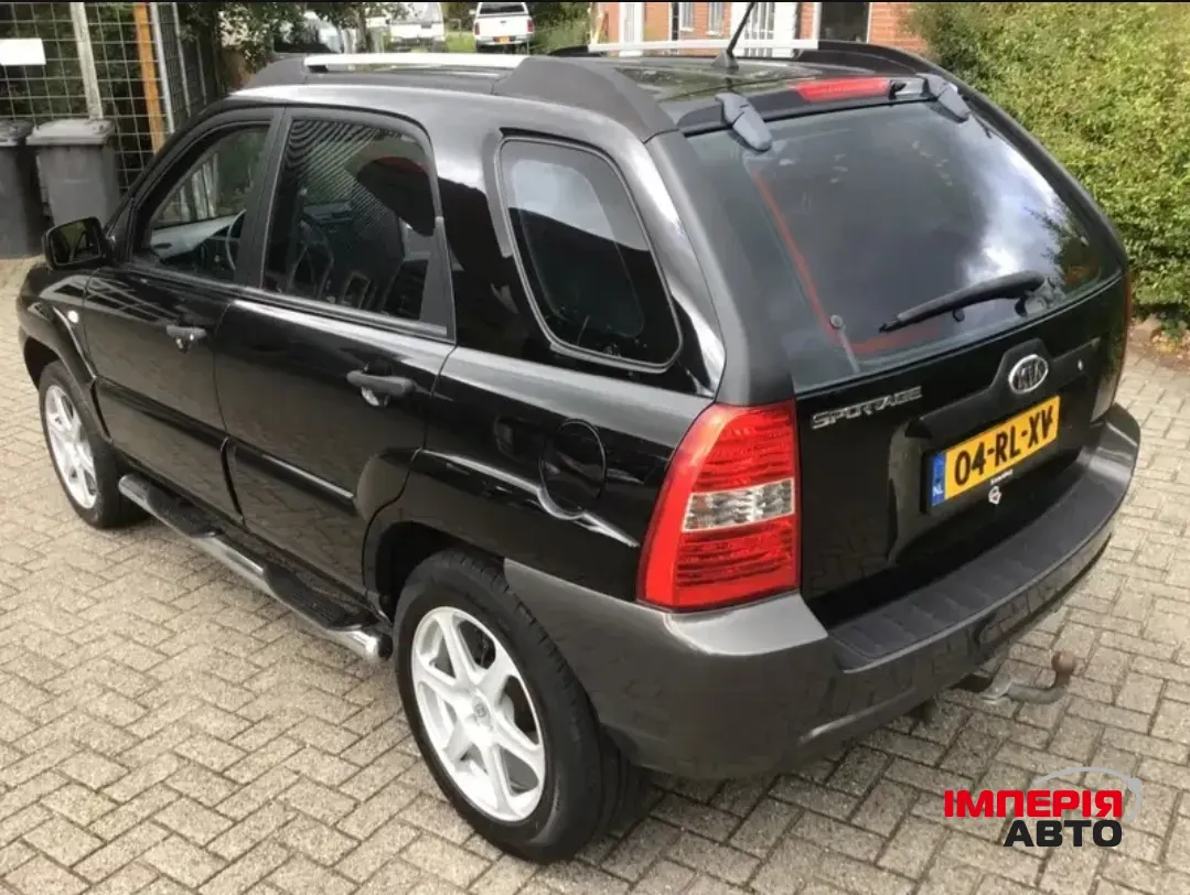 Kia Sportage - фото 8
