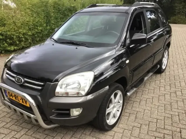 Kia Sportage - фото 1