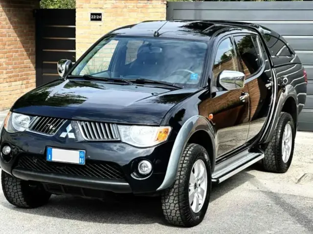 Mitsubishi L200 - фото 1