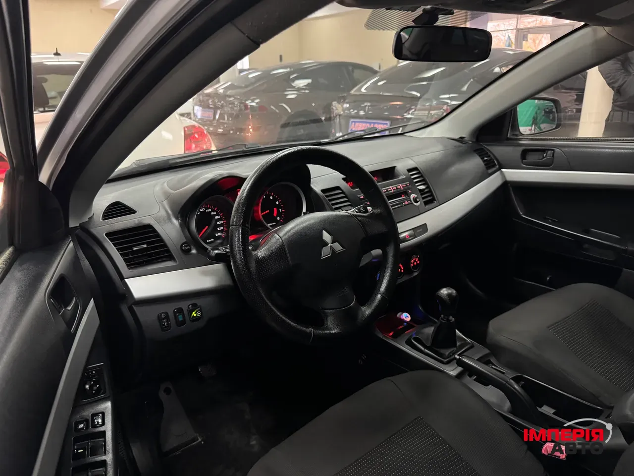 Mitsubishi Lancer - фото 9