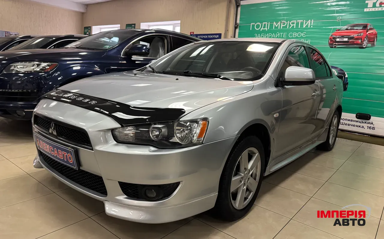 Mitsubishi Lancer - фото 1