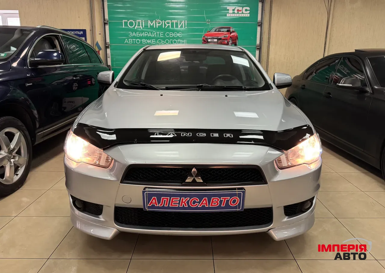 Mitsubishi Lancer - фото 6