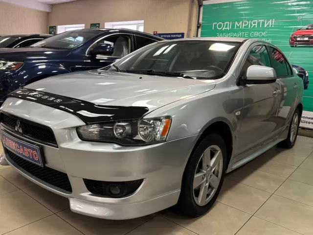 Mitsubishi Lancer - фото 1