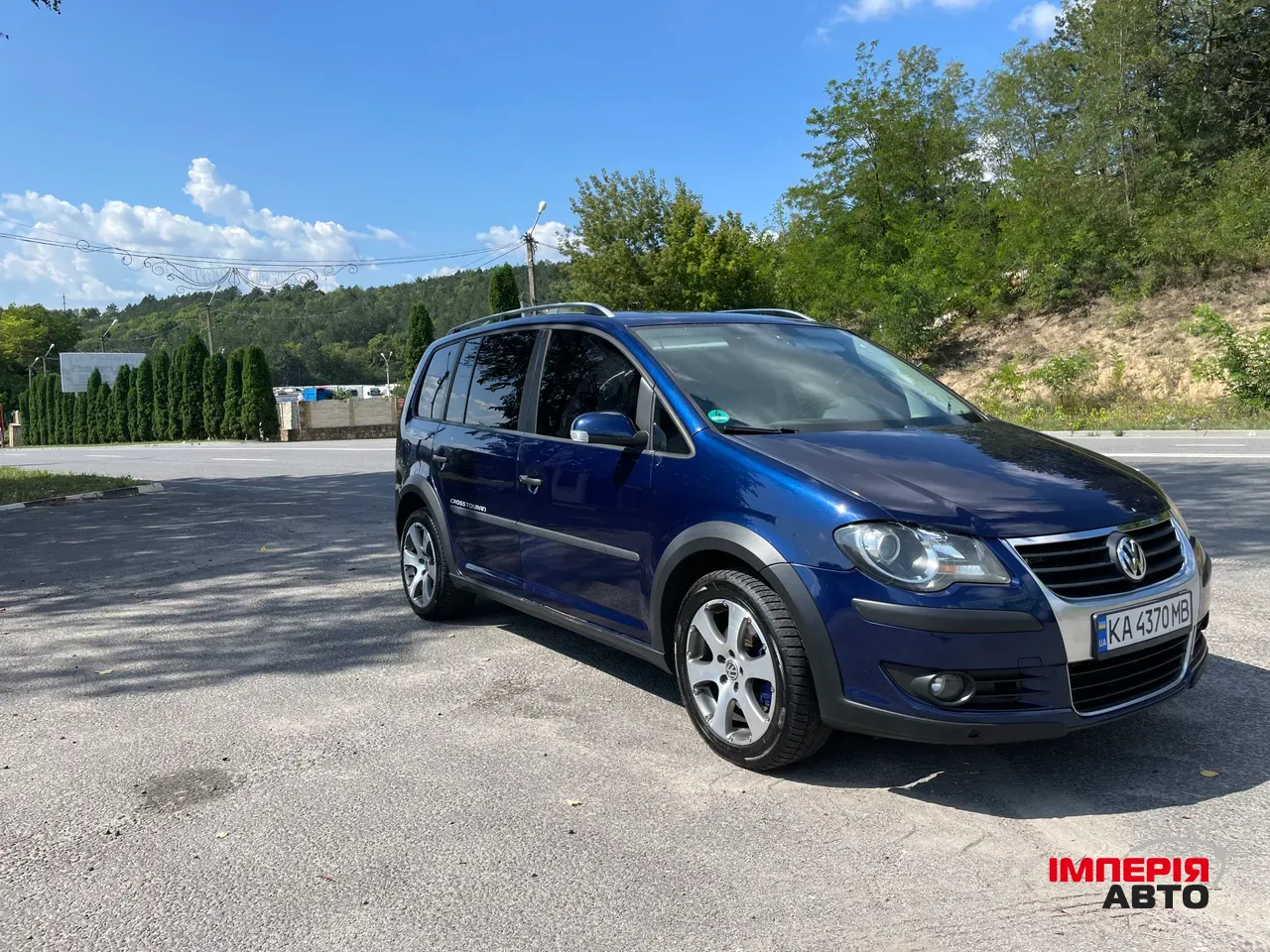 Volkswagen Touran - фото 1