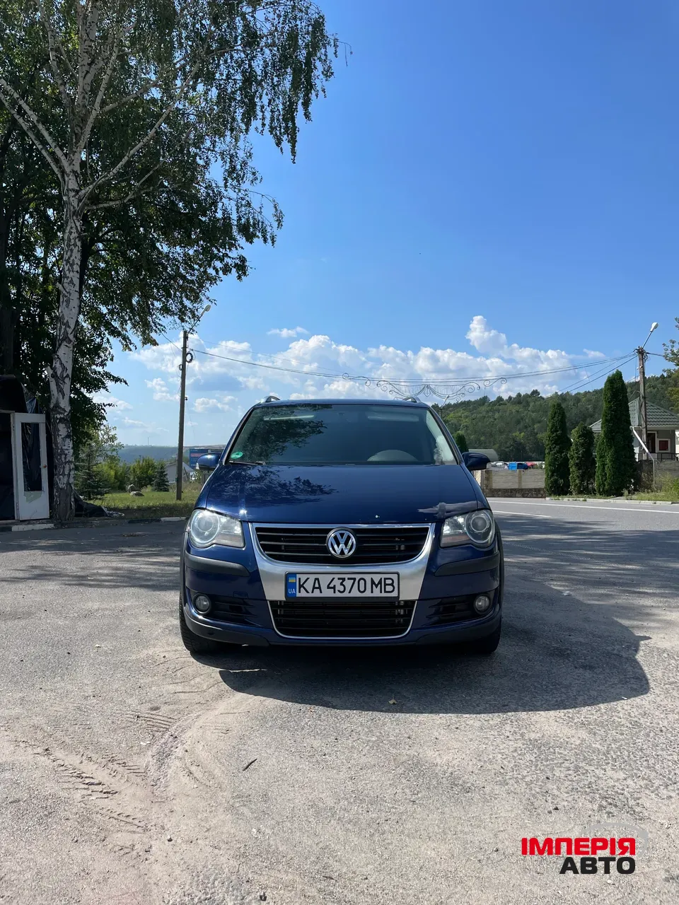 Volkswagen Touran - фото 3