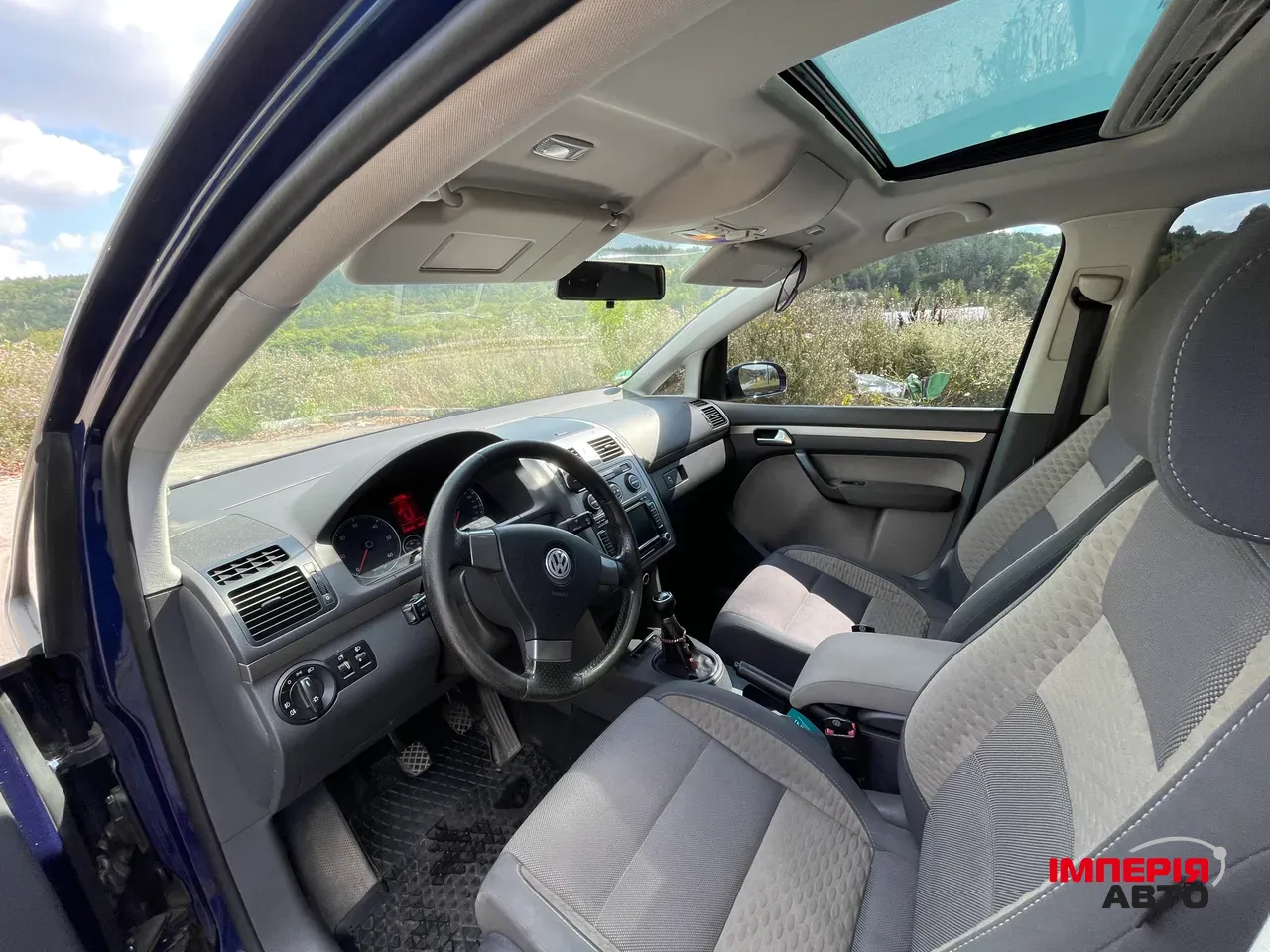 Volkswagen Touran - фото 11