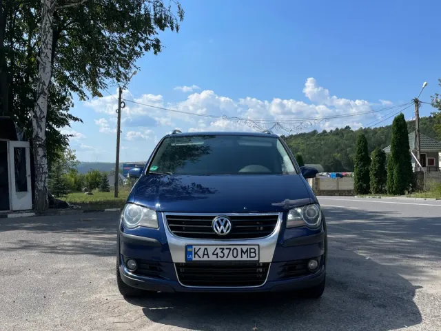 Volkswagen Touran - фото 3