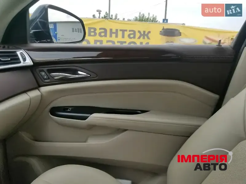 Cadillac SRX - фото 8