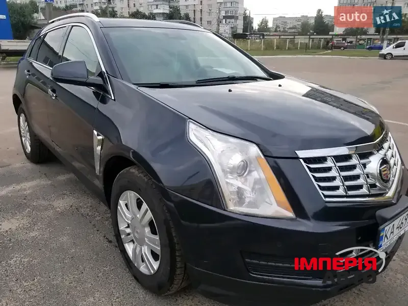 Cadillac SRX - фото 1