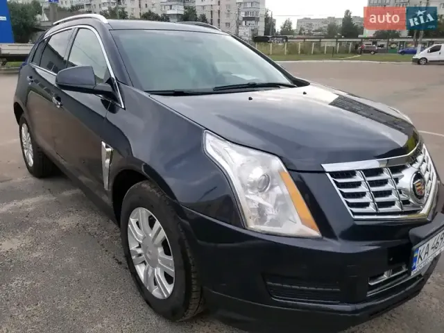 Cadillac SRX - фото 1