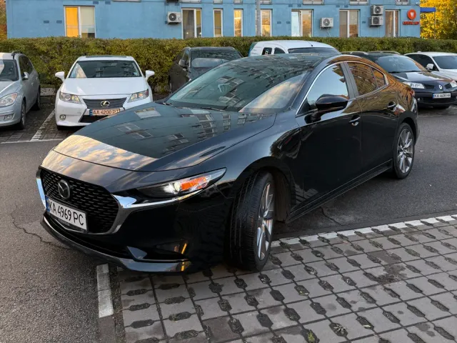 Mazda 3 - фото 3