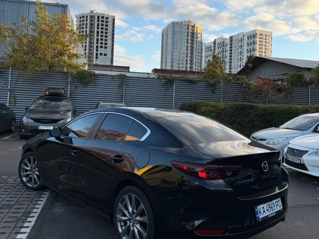 Mazda 3 - фото 4