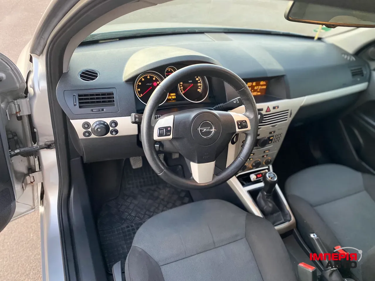 Opel Astra - фото 11